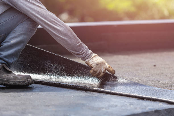 Professional Basement Waterproofing technician working in Avon, OH